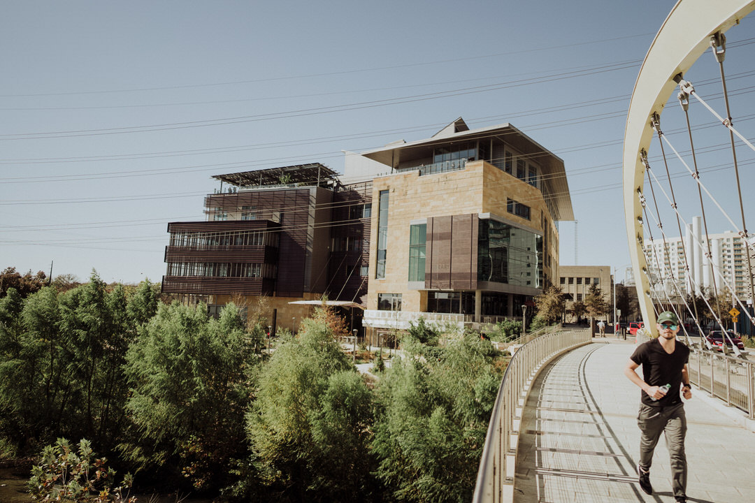 runner in front of austin central library