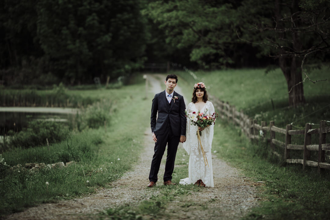 farm portrait of bride and groom