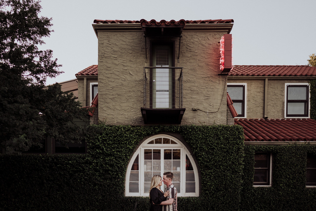 engagement photo in front of hotel san jose austin