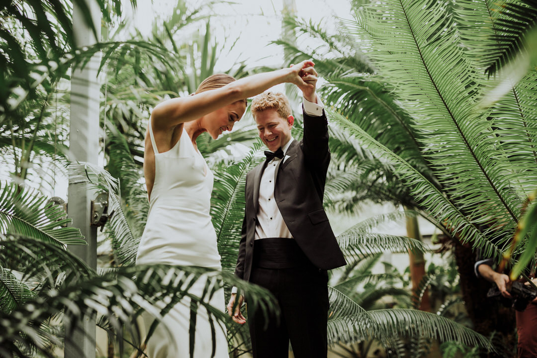 groom spinning bride