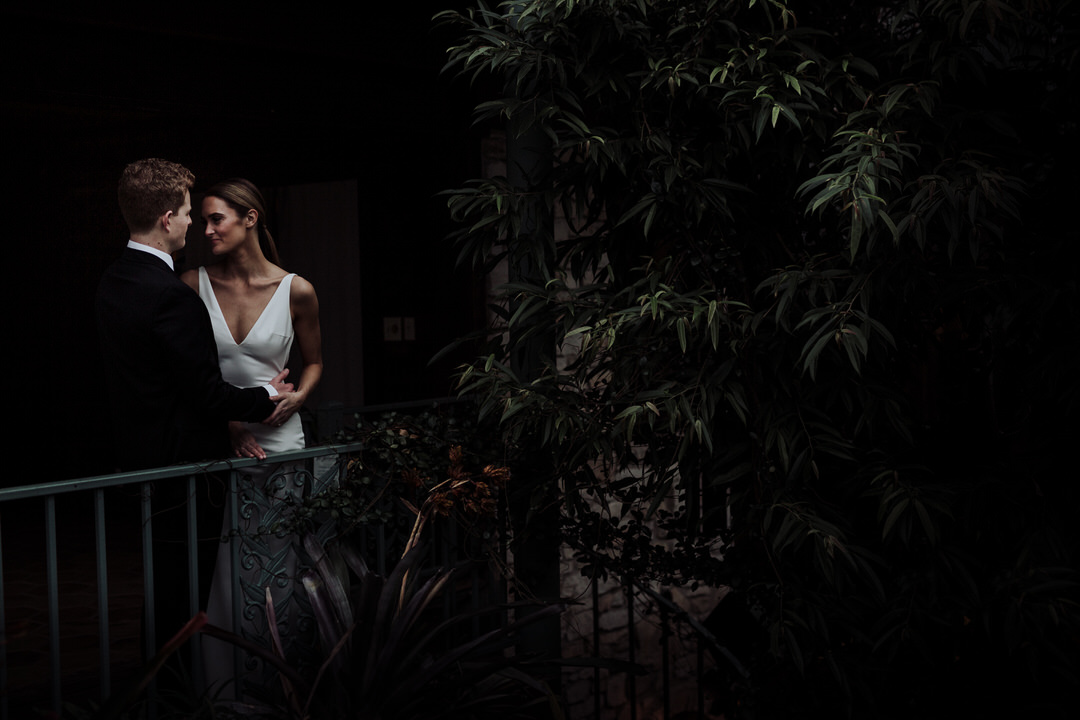 dark portrait with greenery