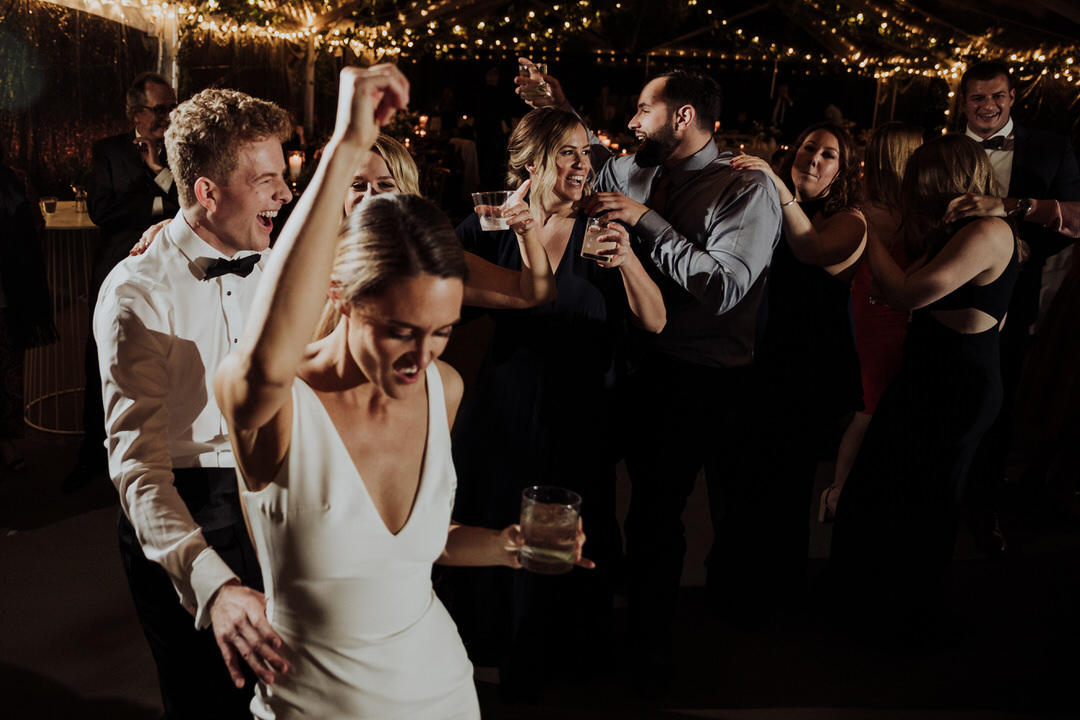 bride dancing with groom at their wedding