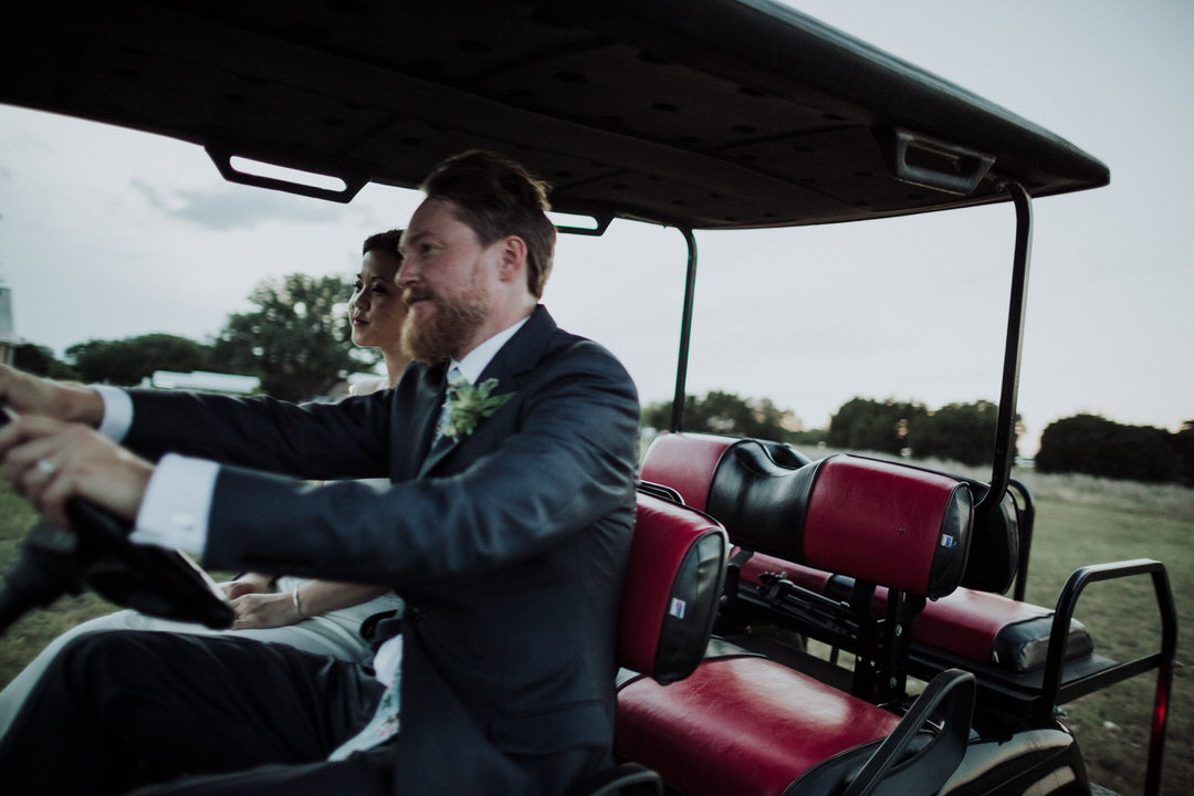 groom driving golf cart