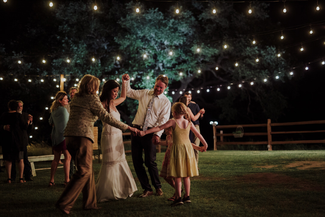 large family dancing photo