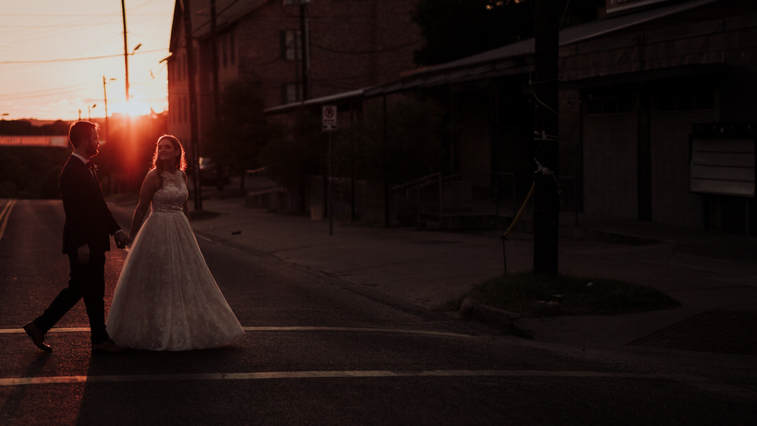 couple walking into sunset