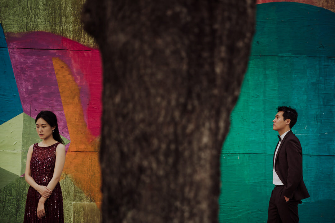 clean composition of couple on colorful background